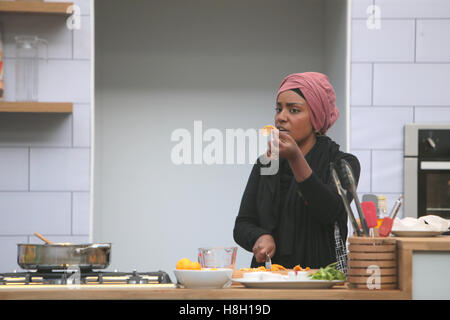 London UK 13 November 2016 London Olympia hosting the BBC Good Food Show with Nadiya Hussain winner of Great British Bake off 2015.Her first cookbook, Nadiya's Kitchen  has just been published, with her children's book, Bake Me A Story slated for publication in September 2016. Added to her books, Nadiya is a columnist for The Times and Essentials. Nadiya is also writing a series of contemporary women's fiction novels with the first to be released in 2017. cooking live on the BBC Good Food Stage at the BBC Good Food Show 2016. Credit:  Paul Quezada-Neiman/Alamy Live News Stock Photo