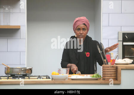 London UK 13 November 2016 London Olympia hosting the BBC Good Food Show with Nadiya Hussain winner of Great British Bake off 2015.Her first cookbook, Nadiya's Kitchen  has just been published, with her children's book, Bake Me A Story slated for publication in September 2016. Added to her books, Nadiya is a columnist for The Times and Essentials. Nadiya is also writing a series of contemporary women's fiction novels with the first to be released in 2017. cooking live on the BBC Good Food Stage at the BBC Good Food Show 2016. Credit:  Paul Quezada-Neiman/Alamy Live News Stock Photo