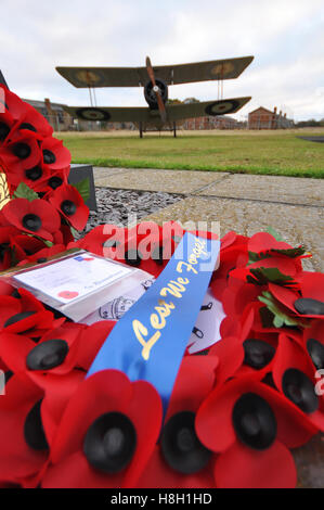 Remembrance Sunday service wreath laying ceremony took place at Stow Maries Aerodrome. A memorial has been erected on the parade ground, by which the service took place Stock Photo