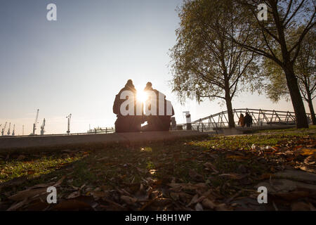 Hamburg, Germany. 13th Nov, 2016. Passerbys are on the go with brilliant sunlight and frosty temperatures in Hamburg, Germany, 13 November 2016. Photo: Christian Charisius/dpa/Alamy Live News Stock Photo