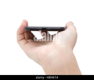 hand holding phone showing usb port connect on white background Stock Photo