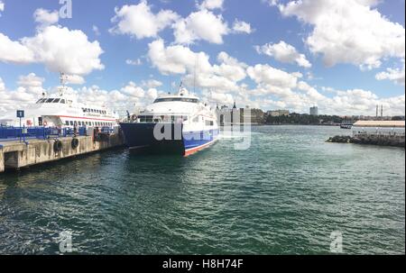 Fast ferry boat at the Kadikoy port. Boats travelling between the European and Asian ports of Istanbul. Commercial name of boat company is IDO. Stock Photo