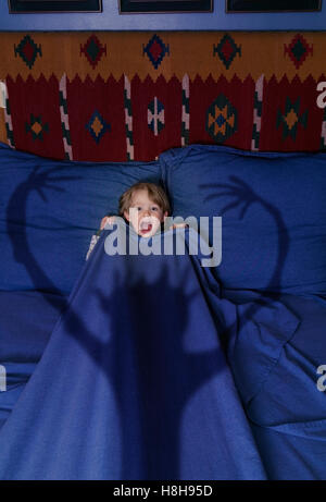 Young boy having a nightmare Stock Photo