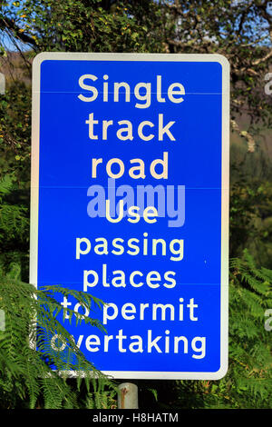 Road traffic sign advising Single Track Road, use passing places to permit overtaking Stock Photo