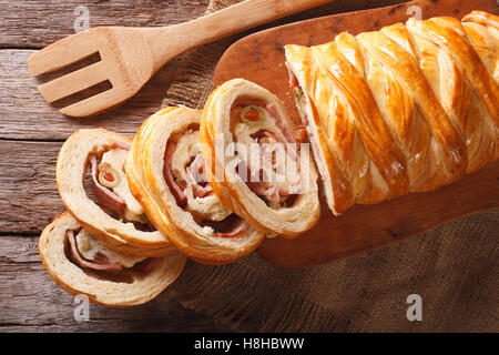 Venezuelan tasty bread pan de jamon close-up on the table. horizontal view from above Stock Photo