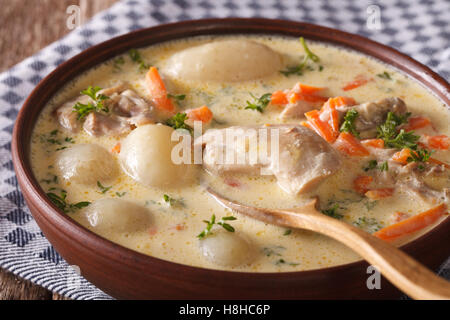 Belgian Ghent WATERZOOI soup with chicken close up in a bowl. horizontal Stock Photo