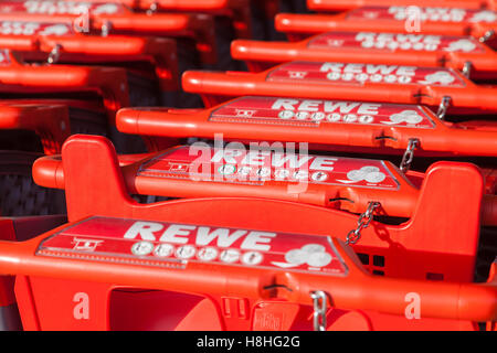BURG / GERMANY - NOVEMBER 13, 2016: Shopping carts of the german supermarket chain, REWE stands together in a row. The REWE Grou Stock Photo
