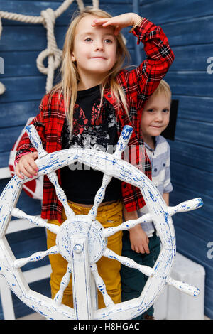 Brother and sister in studio Stock Photo