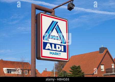 BURG / GERMANY - NOVEMBER 13, 2016: Aldi sign against blue sky. Aldi is a leading global discount supermarket chain with almost Stock Photo