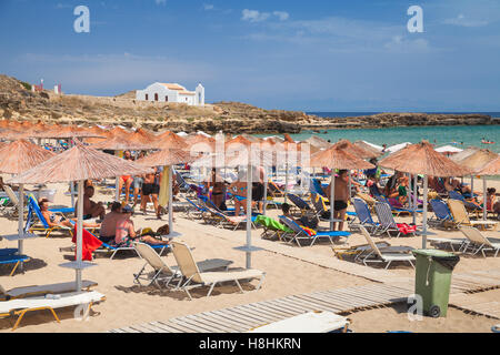 Zakynthos, Greece - August 18, 2016: People relax on Agios Nikolaos beach, Greek island of Zante. It is a popular beach Stock Photo