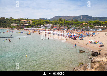 Zakynthos, Greece - August 18, 2016: Tourists relax on Agios Nikolaos beach, Greek island of zante. It is a popular beach Stock Photo