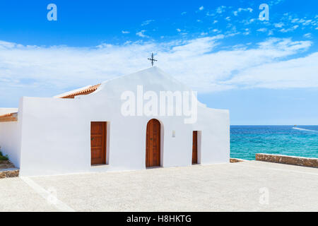 Agios Nikolaos. White Orthodox church on the Sea coast. Zakynthos island, Greece Stock Photo