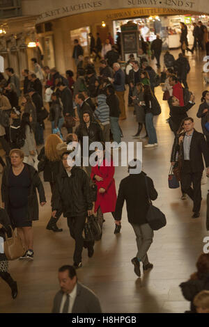 Commuters and travelers scurry through Grand Central Terminal during the morning rush hour in Manhattan, New York City. Stock Photo