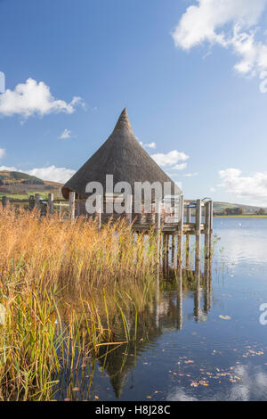 Reconstructed Crannog on Llangorse Lake, 'Llyn Syfaddon' in early morning autumn light, Brecon Beacons National Park, Wales, UK Stock Photo