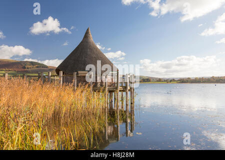 Reconstructed Crannog on Llangorse Lake, 'Llyn Syfaddon' in early morning autumn light, Brecon Beacons National Park, Wales, UK Stock Photo