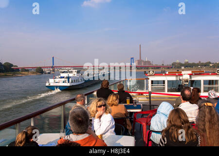 Germany, Ruhr area, Duisburg, harbor tour, excursion boat, in the background the Friedrich-Ebert bridge across the river Rhine. Stock Photo