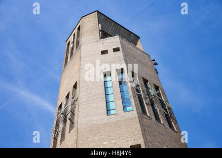 Big brick stone tower with clock in Emmeloord, the Netherlands Stock Photo