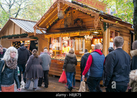 Temporary food stall as part of the Christmas markets in Manchester City centre, UK. Stock Photo