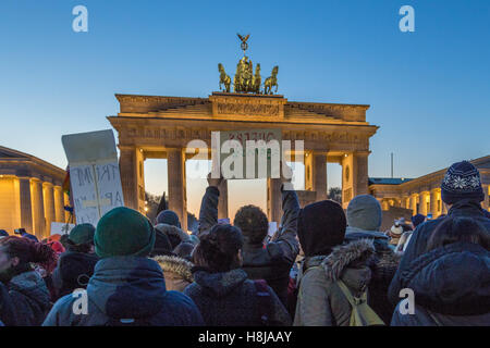 Berlin, Germany. 12th Nov, 2016. At the iconic Brandenburger Gate in Berlin, infront of the US embassy, hundreds of protesters gather to voice their protest against president-elect Donald Trump. © Willi Effenberger/Pacific Press/Alamy Live News Stock Photo