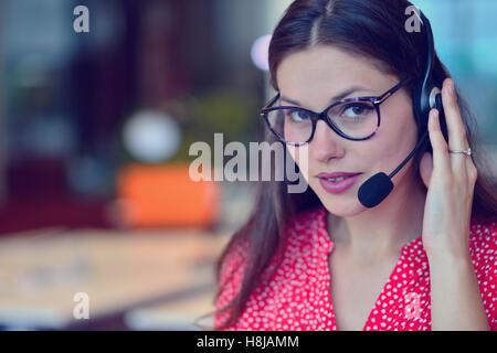 Young woman working in call centre