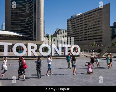 Nathan Phillips Square a major tourist attraction, is an urban plaza in Toronto, Canada. It forms the forecourt to Toronto City Hall Stock Photo