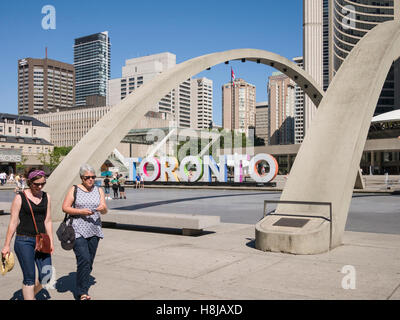 Nathan Phillips Square a major tourist attraction, is an urban plaza in Toronto, Canada. It forms the forecourt to Toronto City Hall Stock Photo