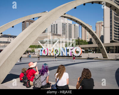 Nathan Phillips Square a major tourist attraction, is an urban plaza in Toronto, Canada. It forms the forecourt to Toronto City Hall Stock Photo