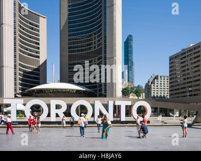 Nathan Phillips Square a major tourist attraction, is an urban plaza in Toronto, Canada. It forms the forecourt to Toronto City Hall Stock Photo