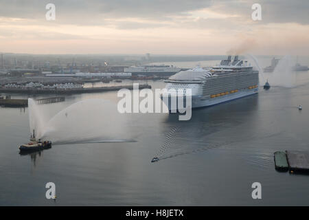 Harmony of the Seas, a cruise ship owned and operated by Royal Caribbean sailing into Southampton, UK. Aerial photos. Stock Photo