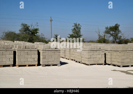 Cinder blocks, which lie in the bays. Storage cinder block. Stock Photo