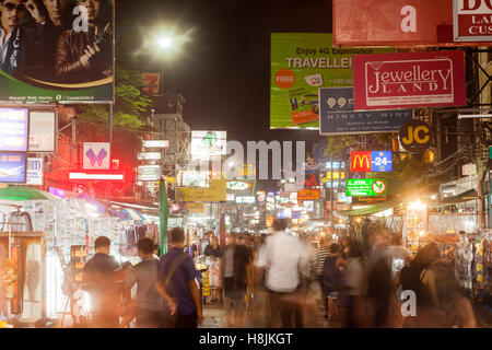 BANGKOK - 20 Oct 2016: Food stands, bars, and tourist shops line Khao San Road on October 20, 2016 in Bangkok Stock Photo