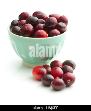 The tasty american cranberries in bowl isolated on white background. Stock Photo