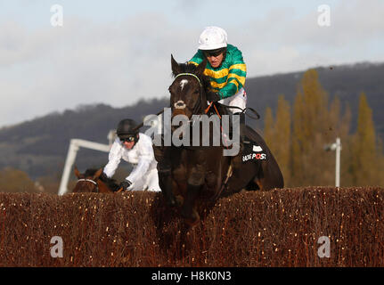 Le Prezien ridden by Barry Geraghty clears the last fence before going on to win The Racing Post Arkle Trophy Trial Novices' Steeple Chase run during The Open Sunday of The Open Festival at Cheltenham Racecourse. Stock Photo