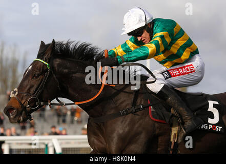 Le Prezien ridden by Barry Geraghty clears the last fence before going on to win The Racing Post Arkle Trophy Trial Novices' Steeple Chase run during The Open Sunday of The Open Festival at Cheltenham Racecourse. Stock Photo