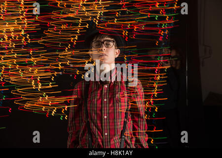 Teen in Swirling Lights Stock Photo