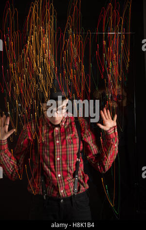 Teen in Swirling Lights Stock Photo