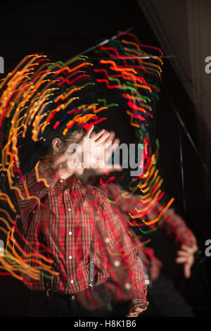 Teen in Swirling Lights Stock Photo