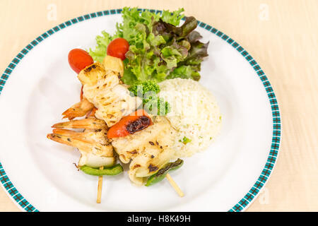 grilled seafood skewer with fried rice Stock Photo