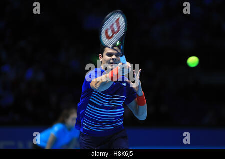 Canada's Milos Raonic in action against France's Gael Monfils during day one of the Barclays ATP World Tour Finals at The O2, London. Stock Photo