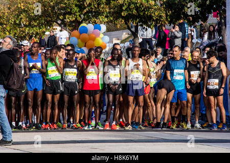 Athens, Greece. 13th Nov, 2016. The runners get ready at the starting line. The 34st Athens Authentic Marathon marks the 120th anniversary of the first contemporary Marathon race in 1896. The event is inspired by the ancient hemerodromos that run from Marathonas to Athens to bring the victorious news of the battle against Persians in 480 BC. The race of 1896 was won by the Greek Spiros Louis. The event is dedicated to Grigoris Lambrakis, a doctor, Balkan Athletic Games champion and pacifist. At the Marathon race more than 18000 athletes competed, making a new record of participants. © PACIFIC  Stock Photo