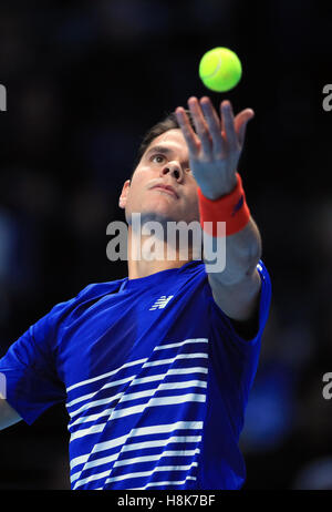 Canada's Milos Raonic serves against France's Gael Monfils during day one of the Barclays ATP World Tour Finals at The O2, London. Stock Photo