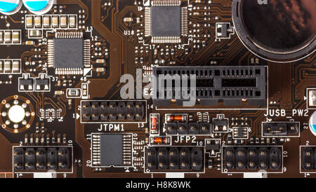 Electronics components on modern PC computer mainboard Stock Photo