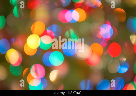 A background of colourful Christmas lights, thrown out of focus Stock Photo