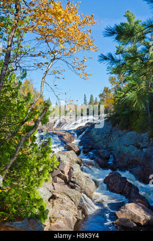 Cascading water over rocks in Superior Lake Provincial park, Canada Stock Photo