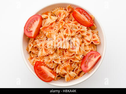 Pasta and tomato sauce in white circle shape bowl Stock Photo
