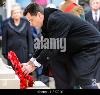 Belfast, Northern, Ireland. 13th Nov, 2016. Secretary of State for Northern Ireland, James Brokenshire, lays a wreath at the Remembrance Sunday service at Belfast City Hall Cenotaph. Credit:  Stephen Barnes/Alamy Live News Stock Photo