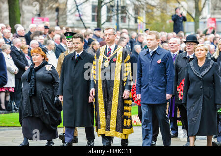 Belfast, Northern, Ireland. 13th Nov, 2016. Lord Lieutenant of Belfast Fionnula Jay-O'Boyle, Secretary of State for Northern Ireland James Brokenshire MP, Lord Mayor of Belfast, Brian Kingson, and Representative of the American Consulate Mr T Douthett lead the procession for the Remembrance Sunday service at Belfast City Hall Cenotaph. Credit:  Stephen Barnes/Alamy Live News Stock Photo