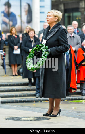 Belfast, Northern, Ireland. 13th Nov, 2016. Irish Tánaiste and Minister for Justice and Equality, Ms Frances Fitzgerald TD. lays a wreath at the Remembrance Sunday service at Belfast City Hall Cenotaph. Credit:  Stephen Barnes/Alamy Live News Stock Photo