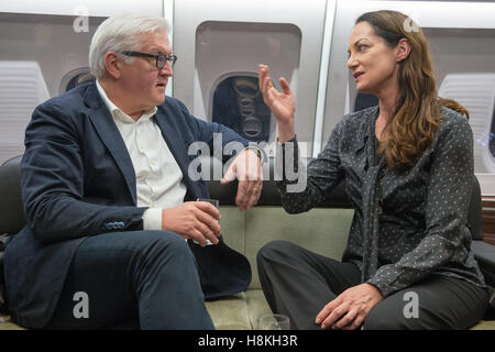 Seoul, South Korea. 30th Oct, 2016. FILE - German Minister of Foreign Affairs Frank Walter Steinmeier (SPD) and actress Natalia Woerner speaking on an Airbus A340 of the German Air Force on the flight from Berlin, Germany, to Seoul, South Korea, 30 October 2016. PHOTO: MAURIZIO GAMBARINI/dpa/Alamy Live News Stock Photo