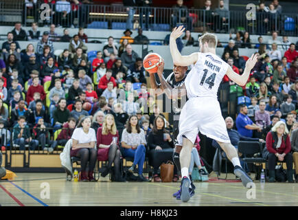 London, UK  13th November, 2016.    London Lions' lose 88-81 to Newcastle Eagles in BBL league basketball match, Olympic Park,  London, UK. London Lions' Alex Owumi with the ball.. Eagles no 14 Scott Martin defends. Copyright Carol Moir/Alamy Live News. Stock Photo